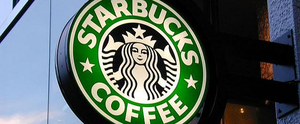 Starbucks logo signage in an urban environment